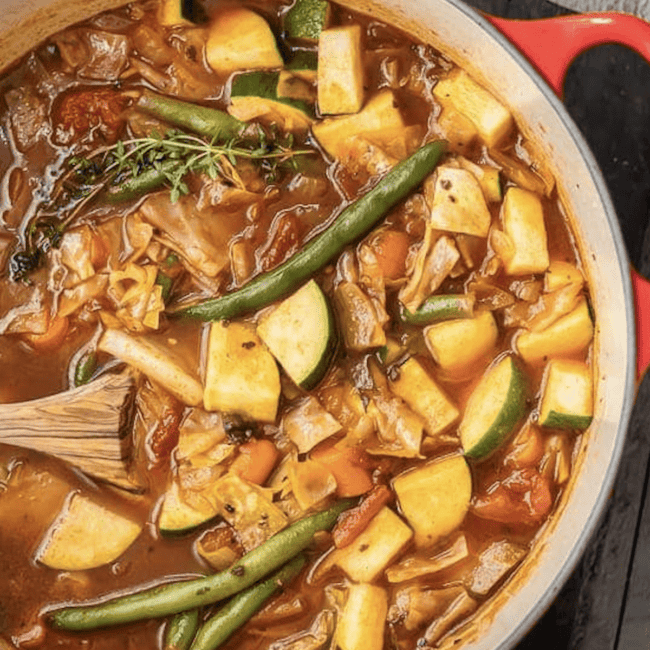 cabbage soup in a red dutch oven