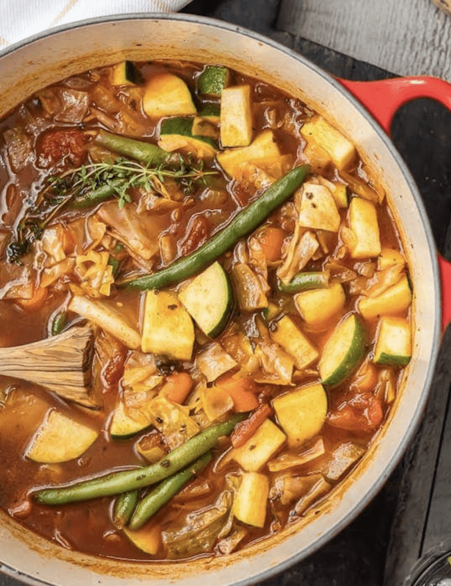 cabbage soup in a red dutch oven