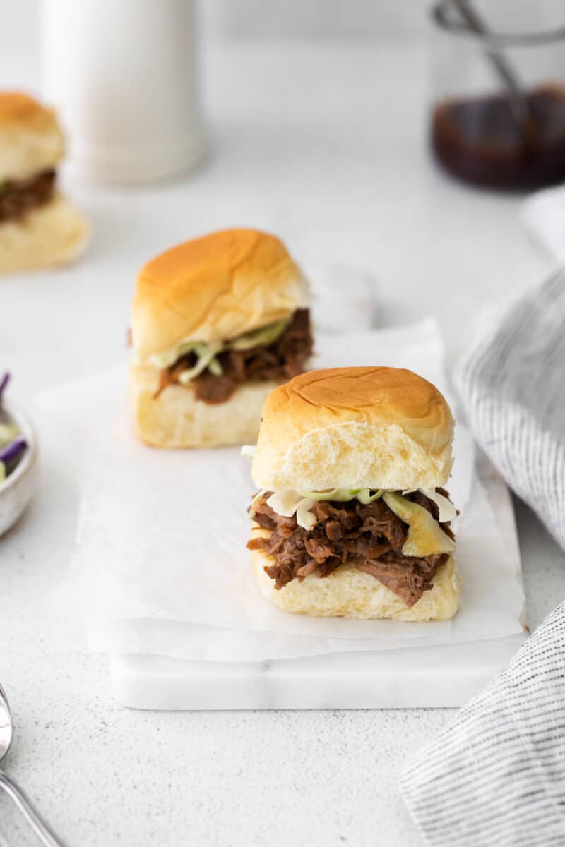 instant pot pulled pork slider on white serving tray