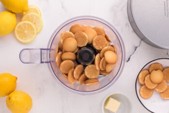 vanilla wafer cookies in the bowl of a food processor.