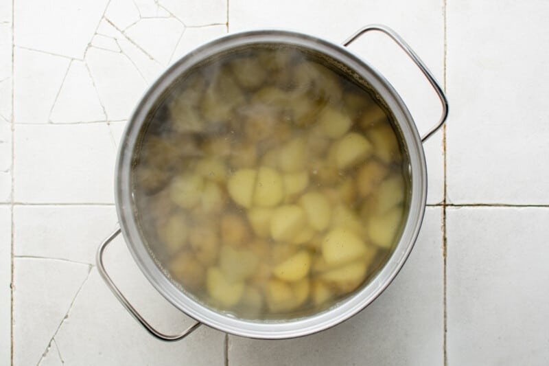 boiled diced potatoes in a pot.