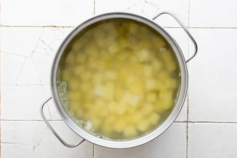cubed potatoes in a large pot with water.
