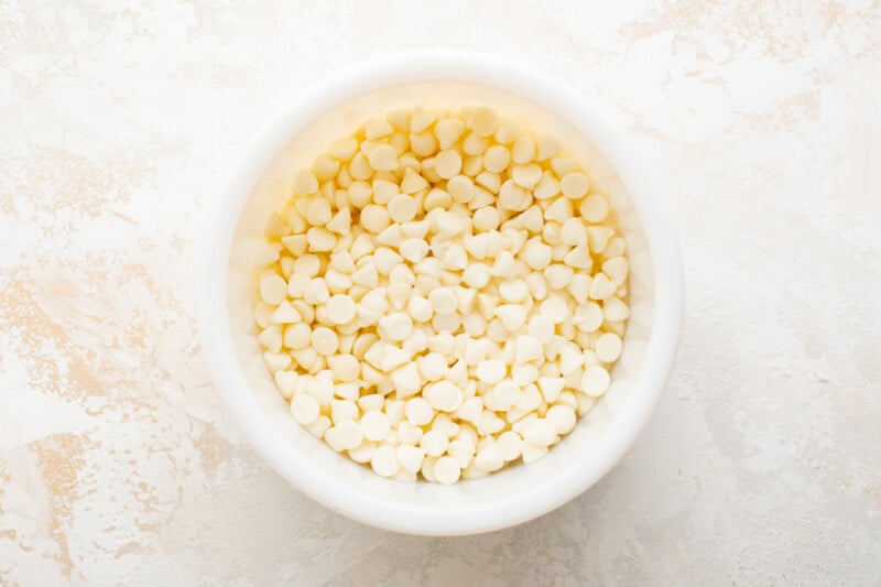 white chocolate chips in a white bowl.