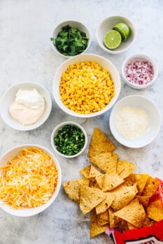 overhead view of ingredients for street corn nachos.