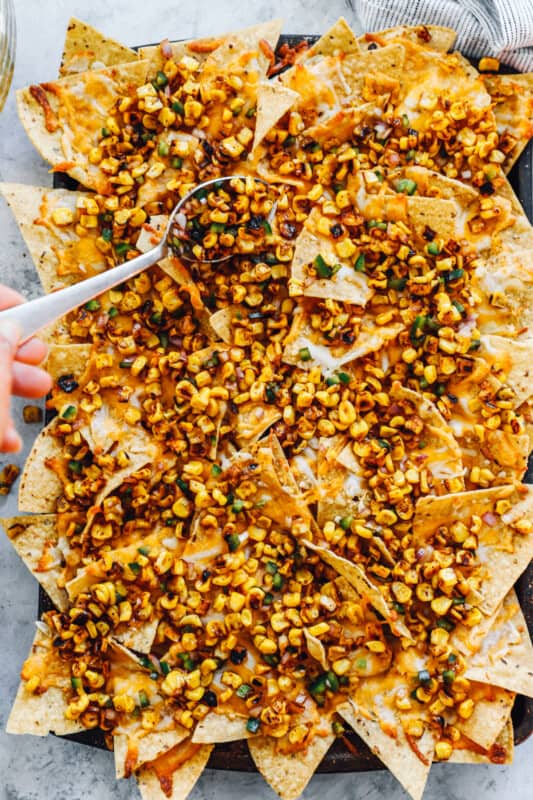 overhead view of ungarnished street corn nachos.