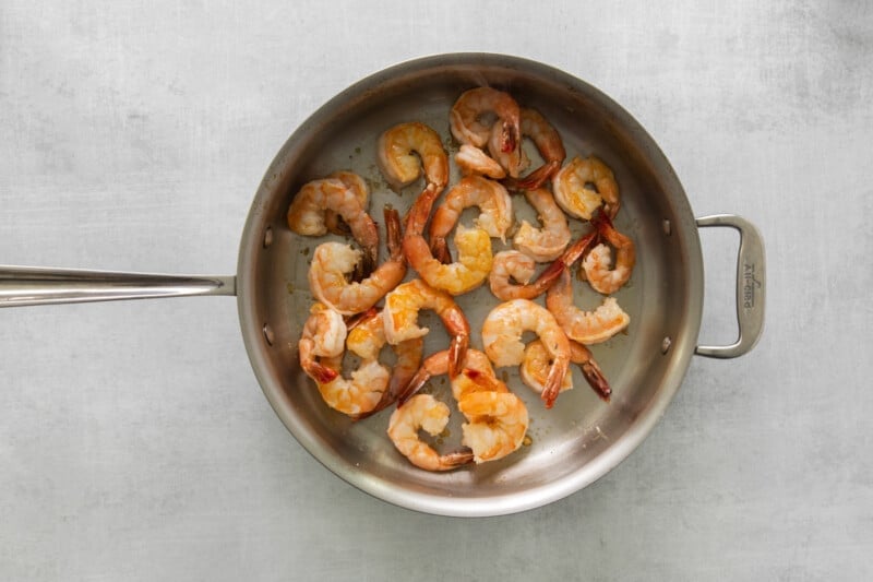 shrimp cooking in a frying pan.