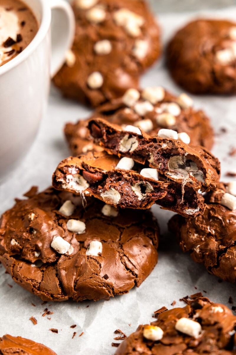 flourless hot chocolate cookie halves stacked on one another to show the interior texture.