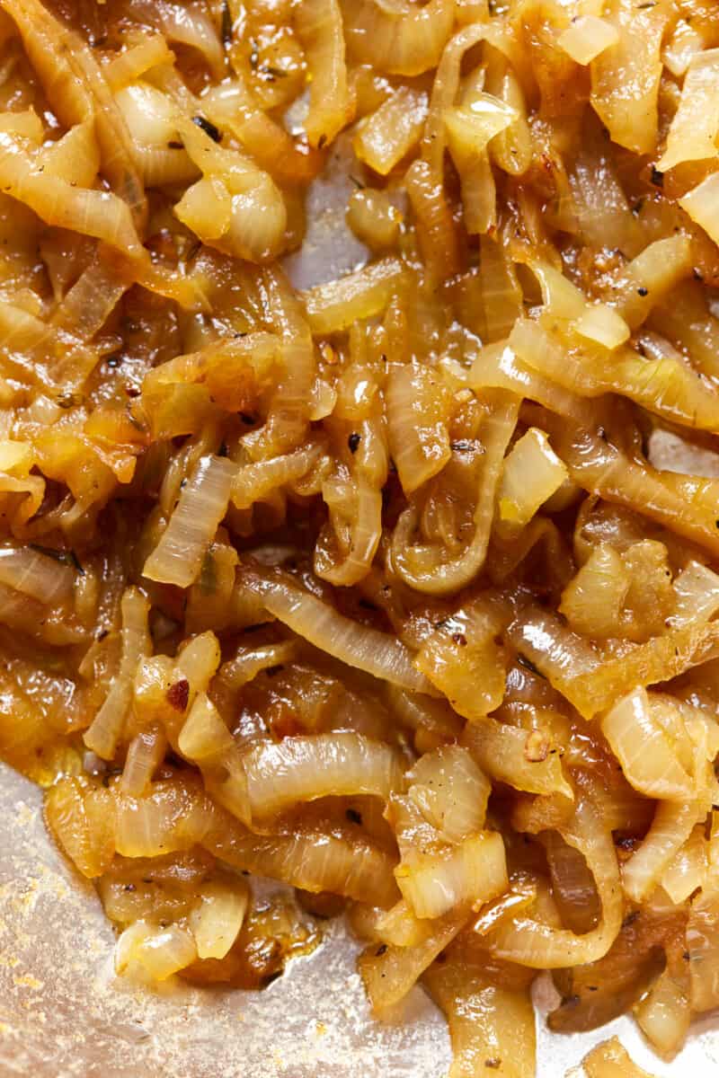 close up overhead view of caramelized onions in a pan.