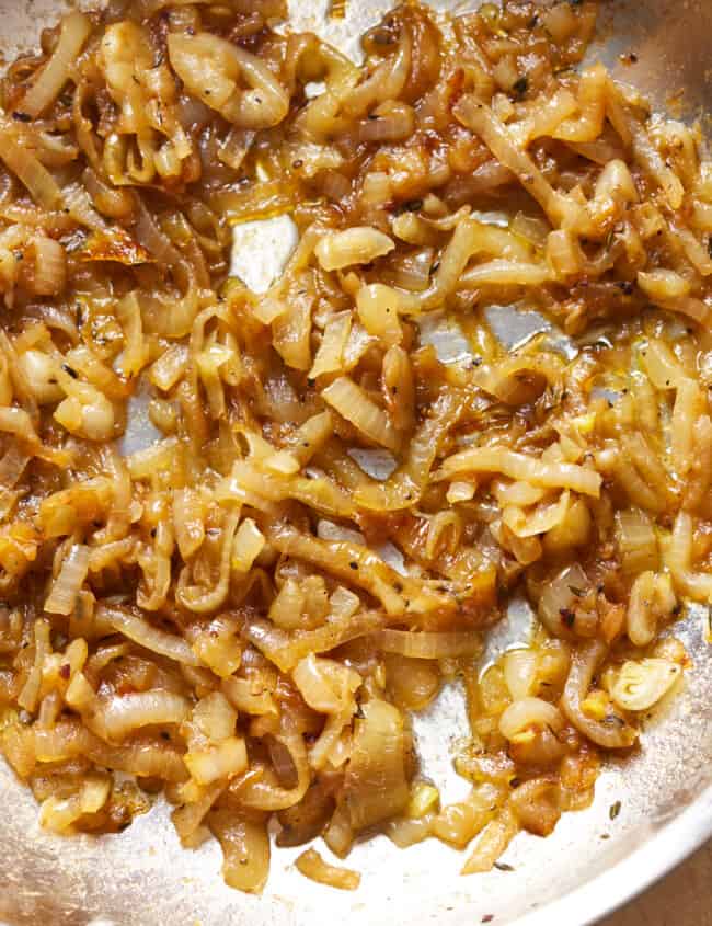 overhead view of caramelized onions in a pan.