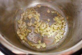 onions sauteeing in an instant pot.