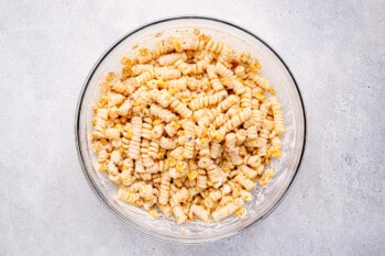 street corn pasta salad in a glass bowl.