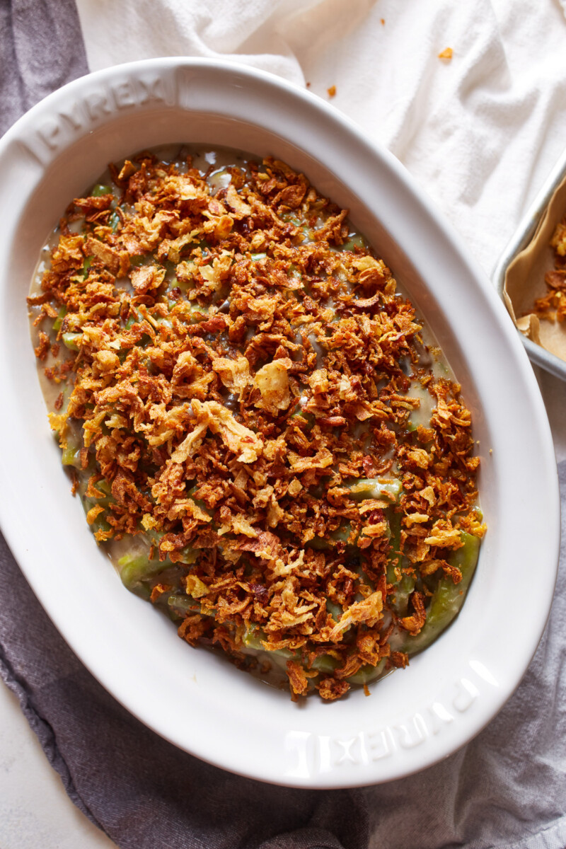 instant pot green bean casserole in a white oval serving bowl.