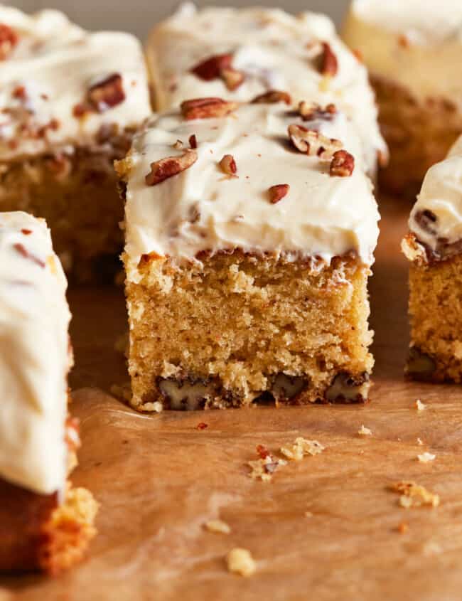 close up side view of Italian cream cake cut into slices.