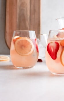 side view of glasses of rose sangria slightly offset.