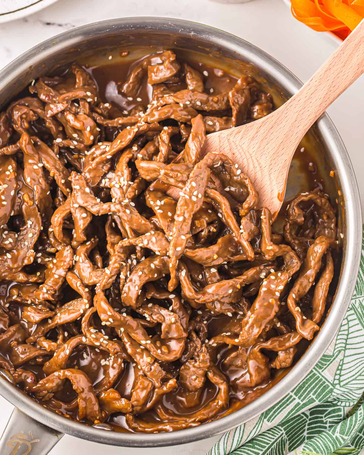 strips of beef cooking in a Korean bulgogi sauce.