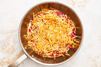 overhead view of chicken enchilada skillet in a skillet.