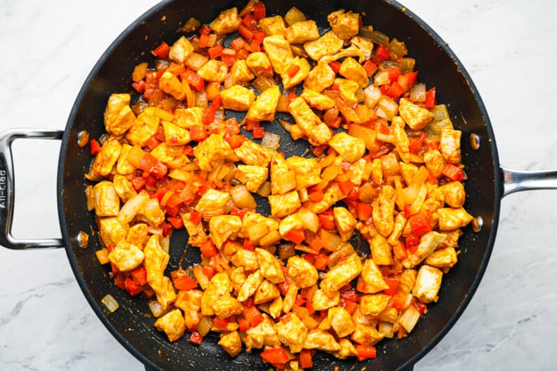 chicken quesadilla filling in a frying pan.