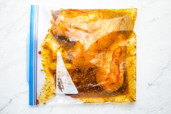 marinating chicken breasts in a ziplock bag.