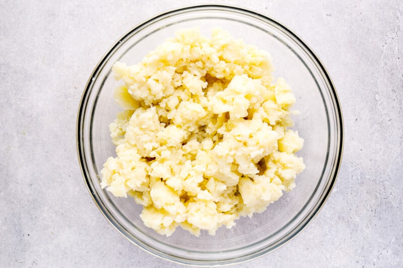 food processed potatoes in a glass bowl.