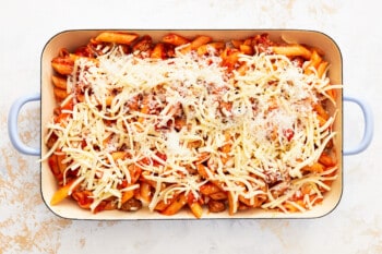 baked mostaccioli topped with shredded cheese