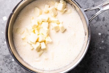 melted butter in a pan on a grey background.