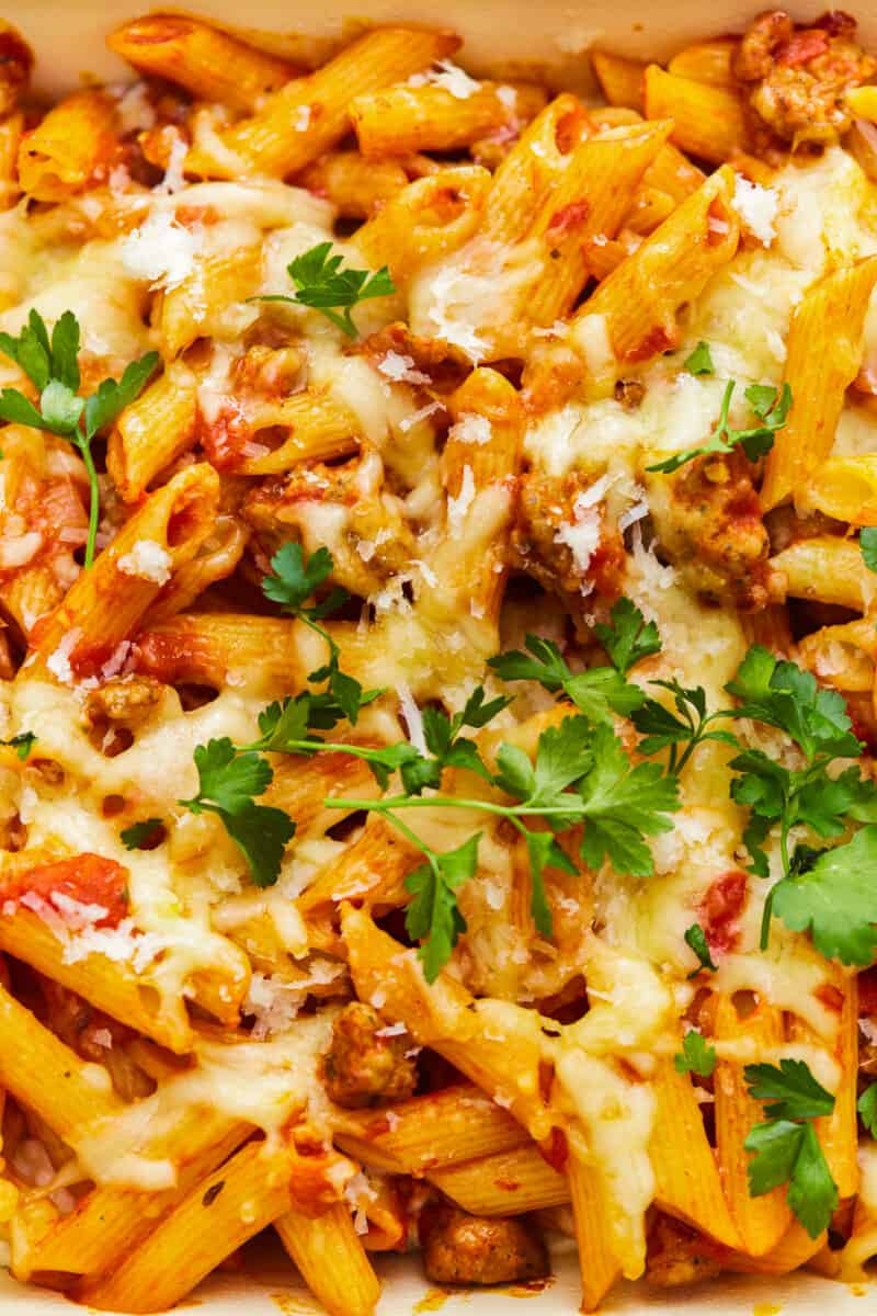 close up on cheesy mostaccioli with meat sauce