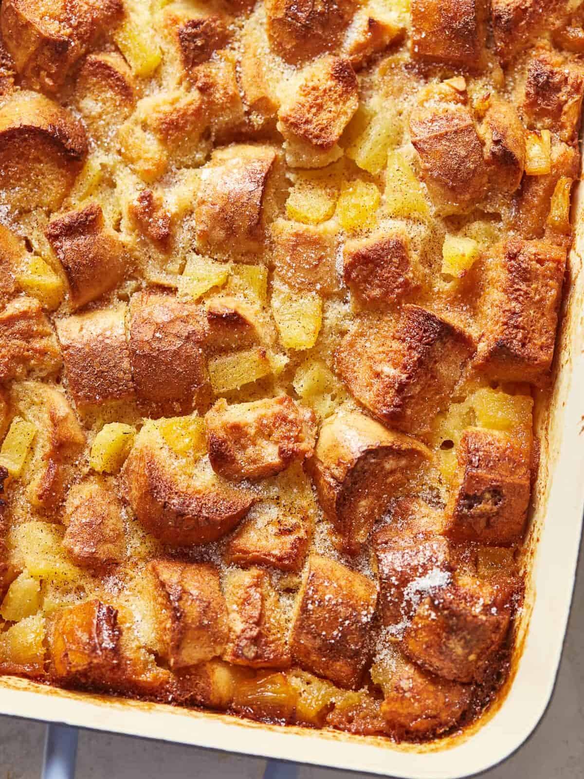close up on a dish of pineapple bread pudding casserole