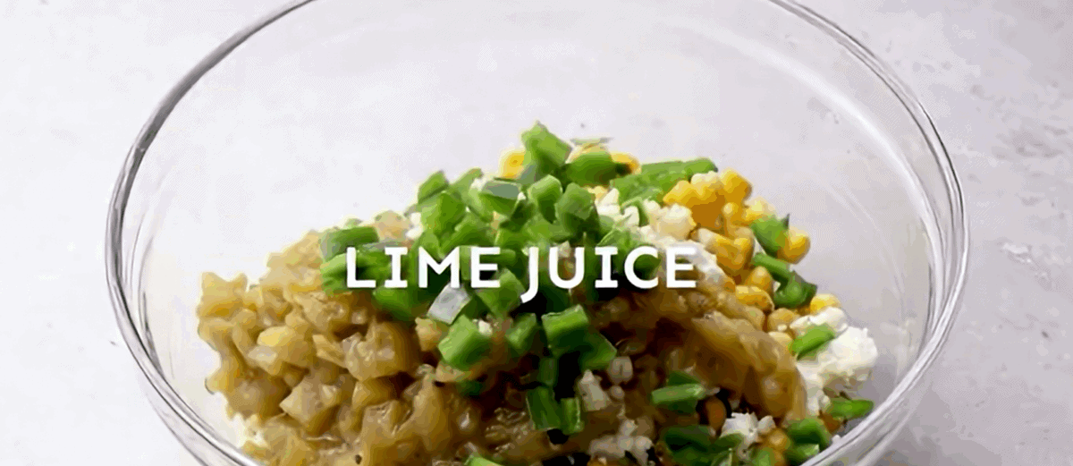 Adding seasoning to the cooked corn in a glass bowl. - 8