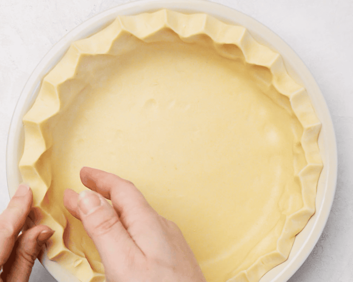 Preparing a pie crust.
