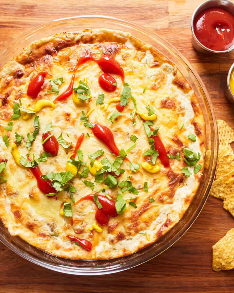 overhead view of cheeseburger dip in a round baking dish.