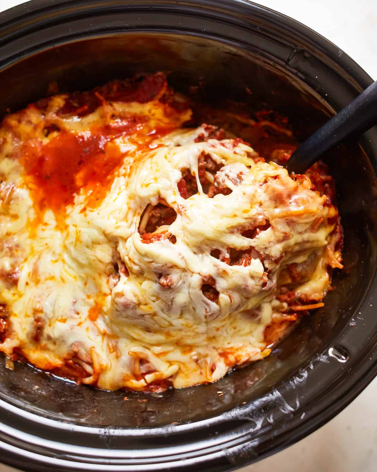 overhead view of spaghetti casserole in a crockpot 
