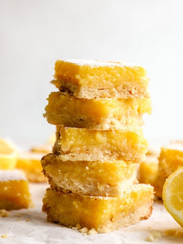 Stack of gluten-free lemon bars with shortbread crust and creamy lemon filling