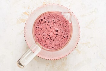 blackberry margaritas in a glass pitcher.