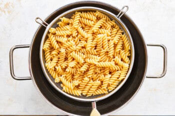 rotini pasta cooking in a pot