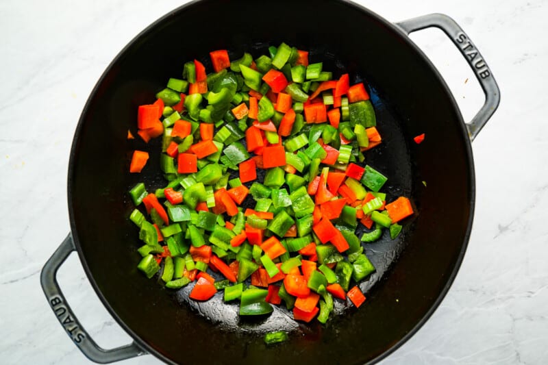 stir fried peppers in a wok.