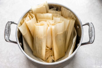 uncooked tamales in a pot.