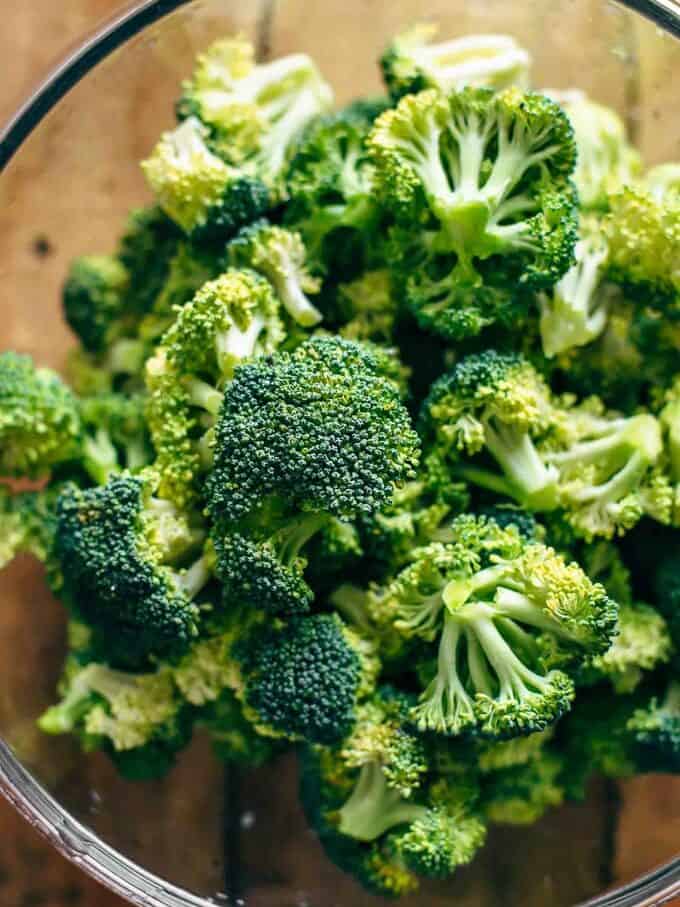 a glass bowl of fresh broccoli