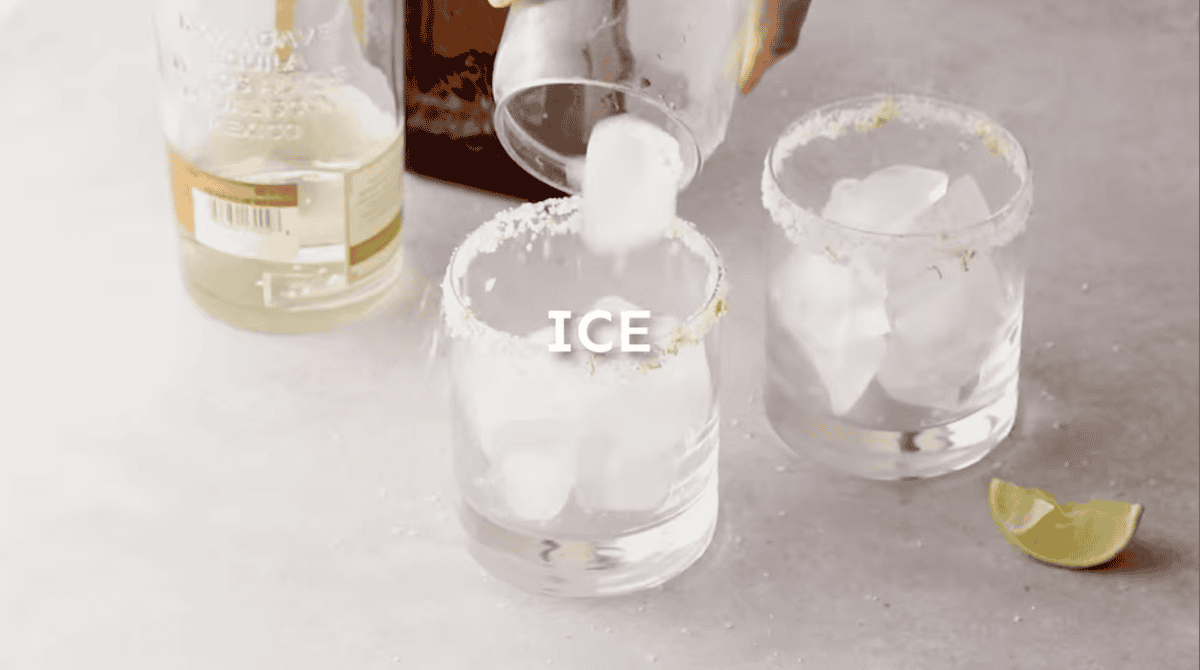 filling a salt-rimmed glass with ice.