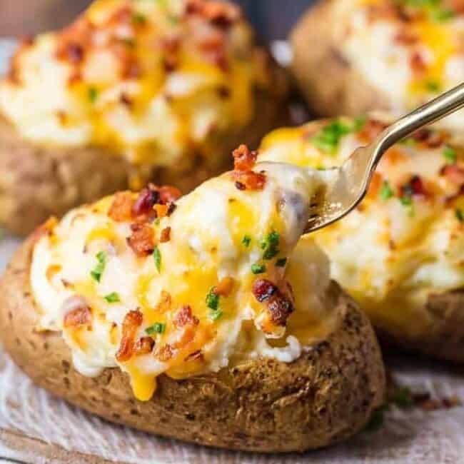This is the BEST TWICE BAKED POTATOES RECIPE and I'm going to tell you exactly how to make it. This creamy, cheesy, crispy Twice Baked Potato recipe is just too good and I can't get enough of it. These potatoes are the perfect side dish for any meal. They are filled with all the best ingredients and they're absolutely filled with flavor too!