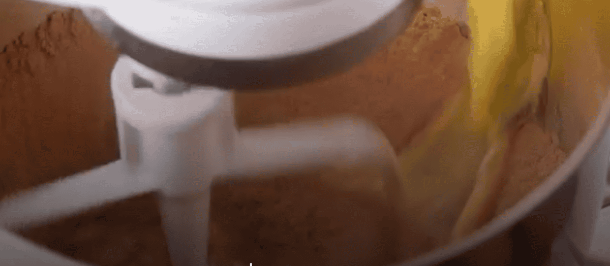 Pouring wet ingredients into dry and mixing. 