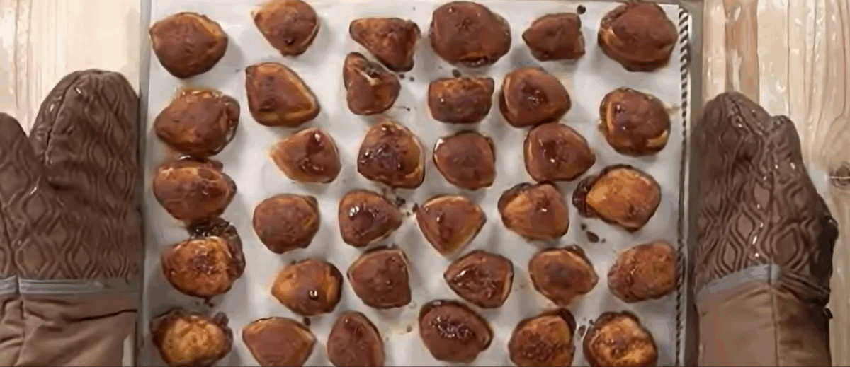A tray of cinnamon sugar bites after being under the broiler. 