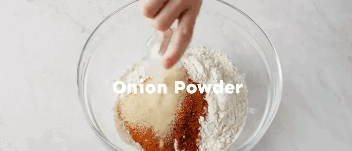 Combining the ingredients for the breading. 