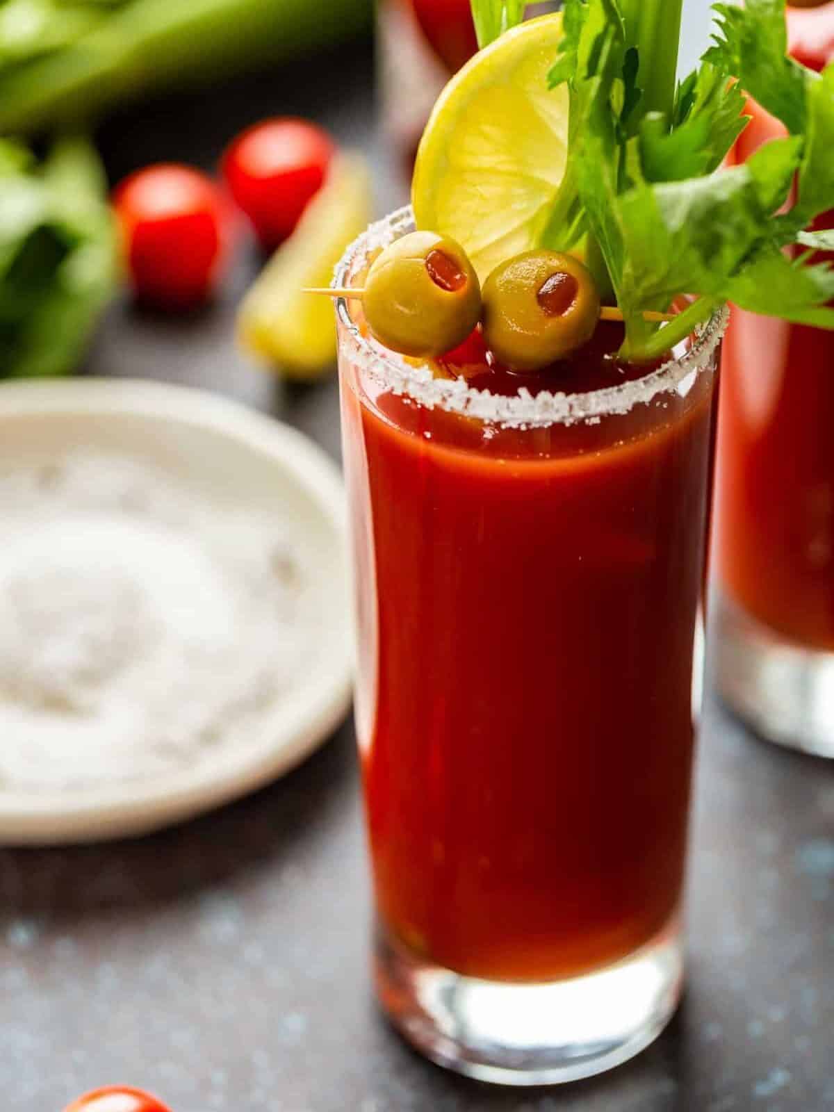Bloody Mary garnished with olives and celery
