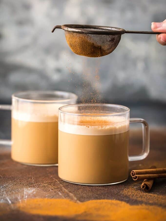 This Bulletproof Coffee recipe is creamy, delicious, & filled with healthy fats. It's keto-friendly and will give you a steady boost of energy to start your morning! Topping fresh coffee with ground cinnamon