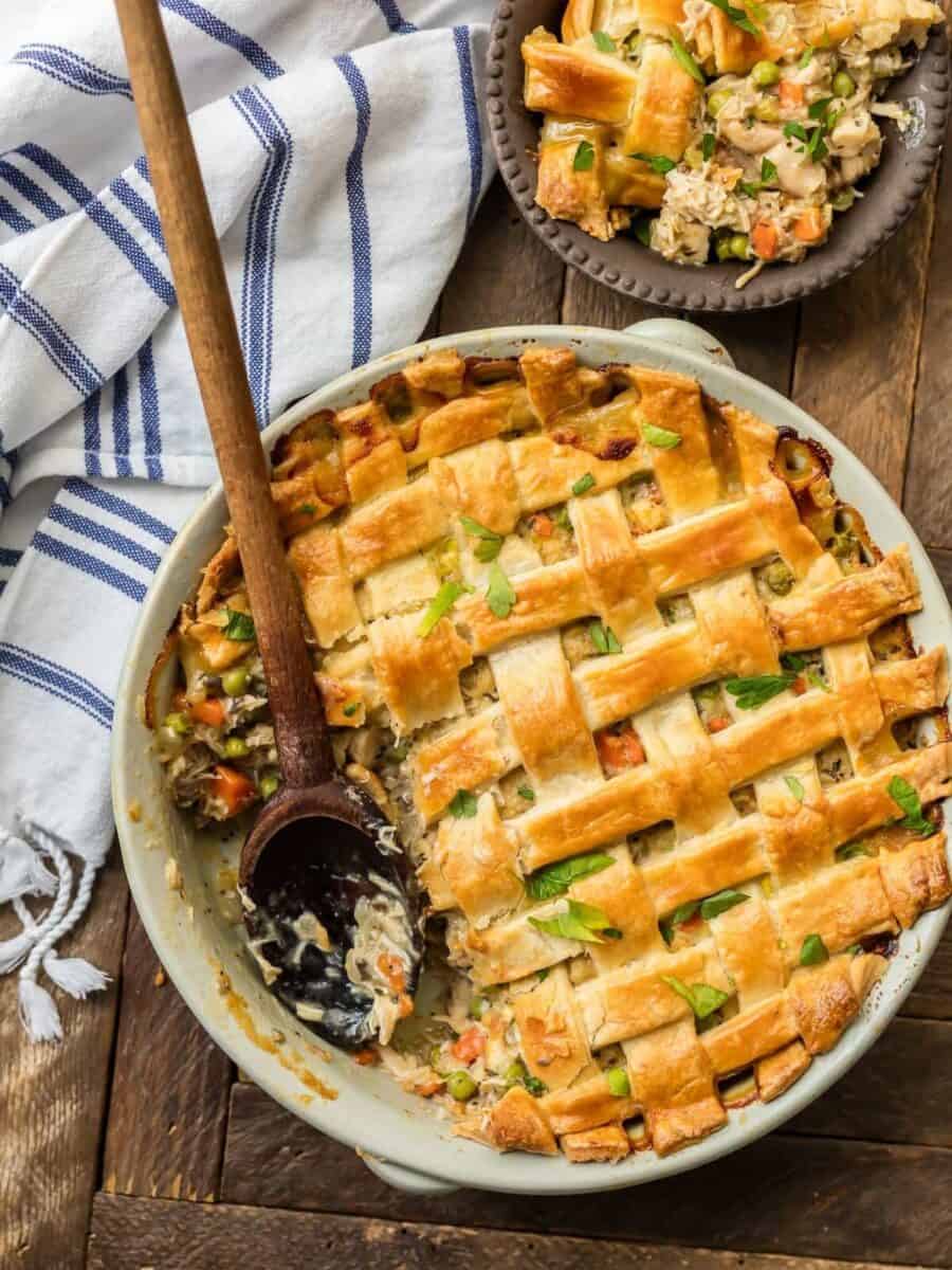 Chicken Pot Pie Casserole is such an easy way to make Chicken Pot Pie. This crazy good Recipe for Chicken Pot Pie is the ultimate easy comfort food! This AMAZING Chicken Pot Pie Recipe is loaded with carrots, peas, chicken, and topped with flakey pie crust. OBSESSED is an understatement! 