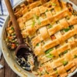 overhead picture of chicken pot pie casserole in light green baking dish