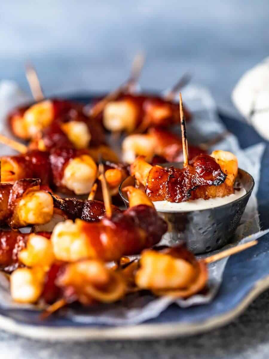 bacon shrimp appetizers on a serving plate