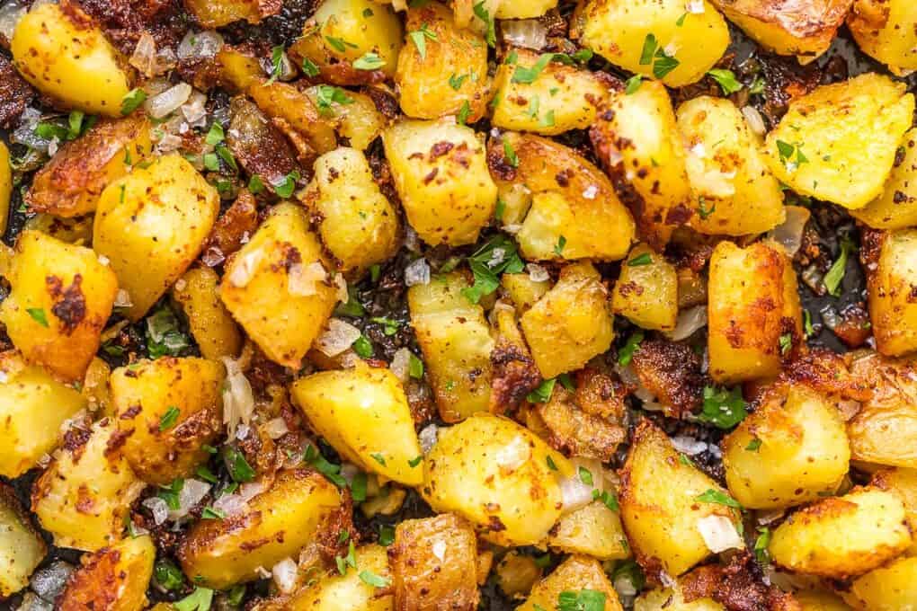 close up on homestyle diner potatoes, fried until golden brown