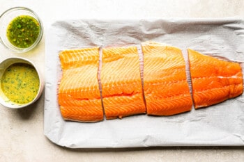 a salmon side cut into 4 fillets.