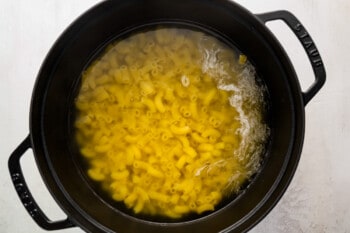macaroni cooking in a dutch oven.